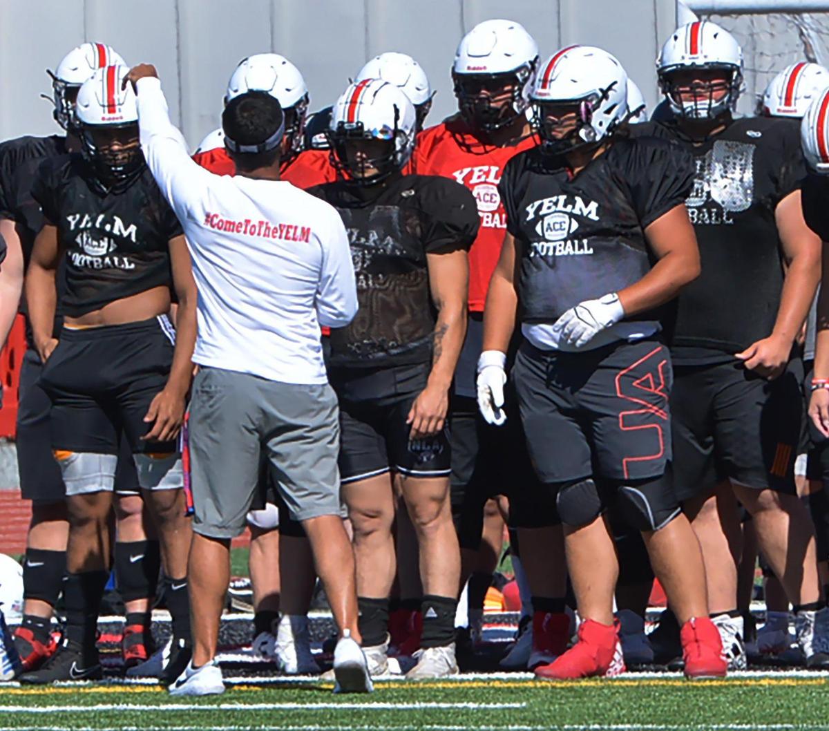 Yelm head coach Jason Ronquillo directs afternoon practice on Monday, August 22 as the Tornados prepare for the 2022 season