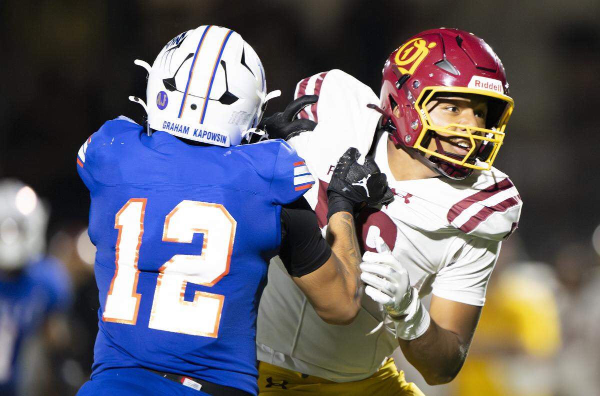 O'Dea Fighting Irish defensive lineman Sioeli Siale (58) works against Graham-Kapowsin Eagles wide receiver Blake Pearson (12) during the second half of the game at Art Crate Field, on Friday, Sept. 5, 2025, in Spanaway, Wash.