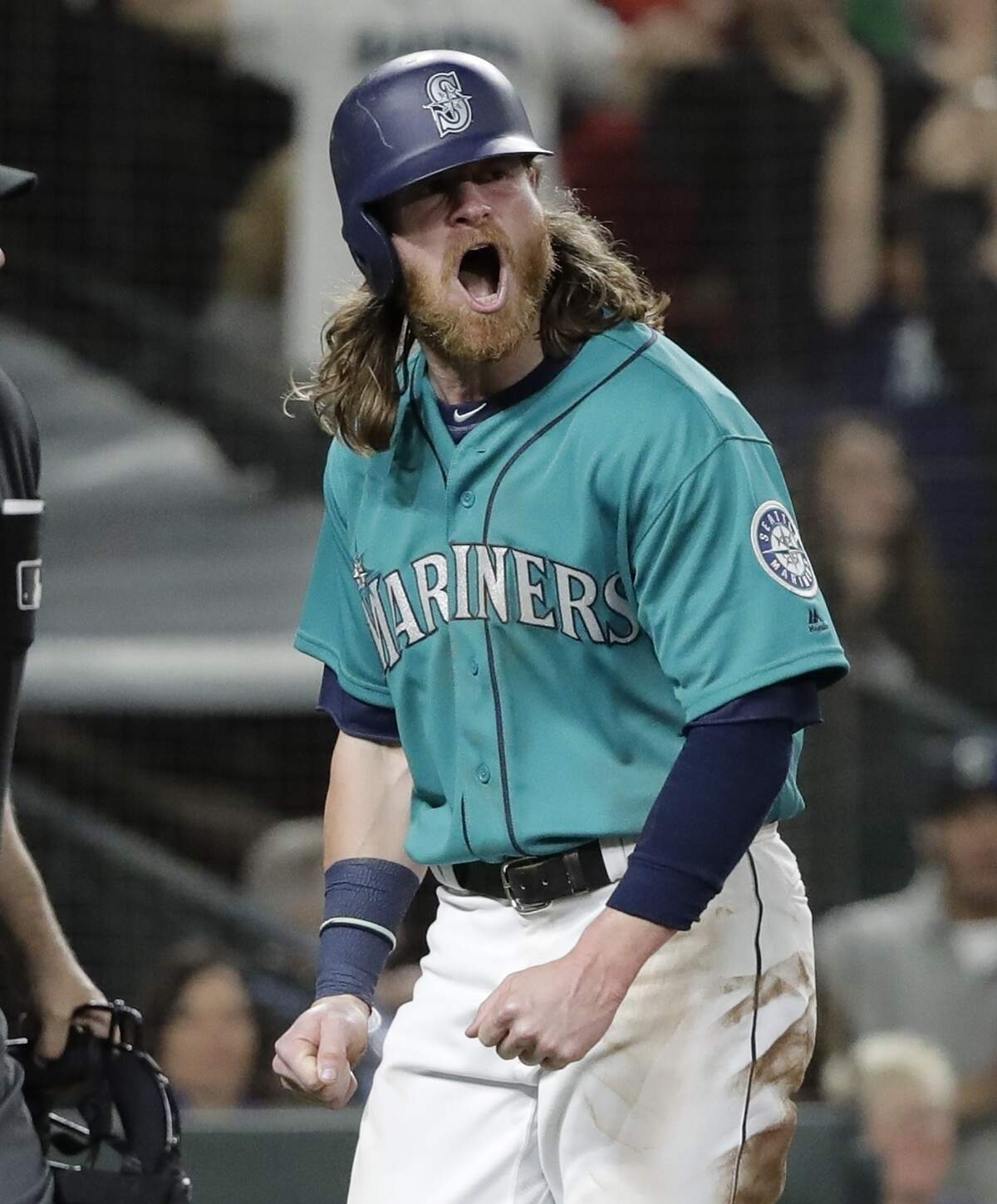 Seattle Mariners' Ben Gamel reacts after he scored a run against the Boston Red Sox during a baseball game, Friday, June 15, 2018, in Seattle. (AP Photo/Ted S. Warren)