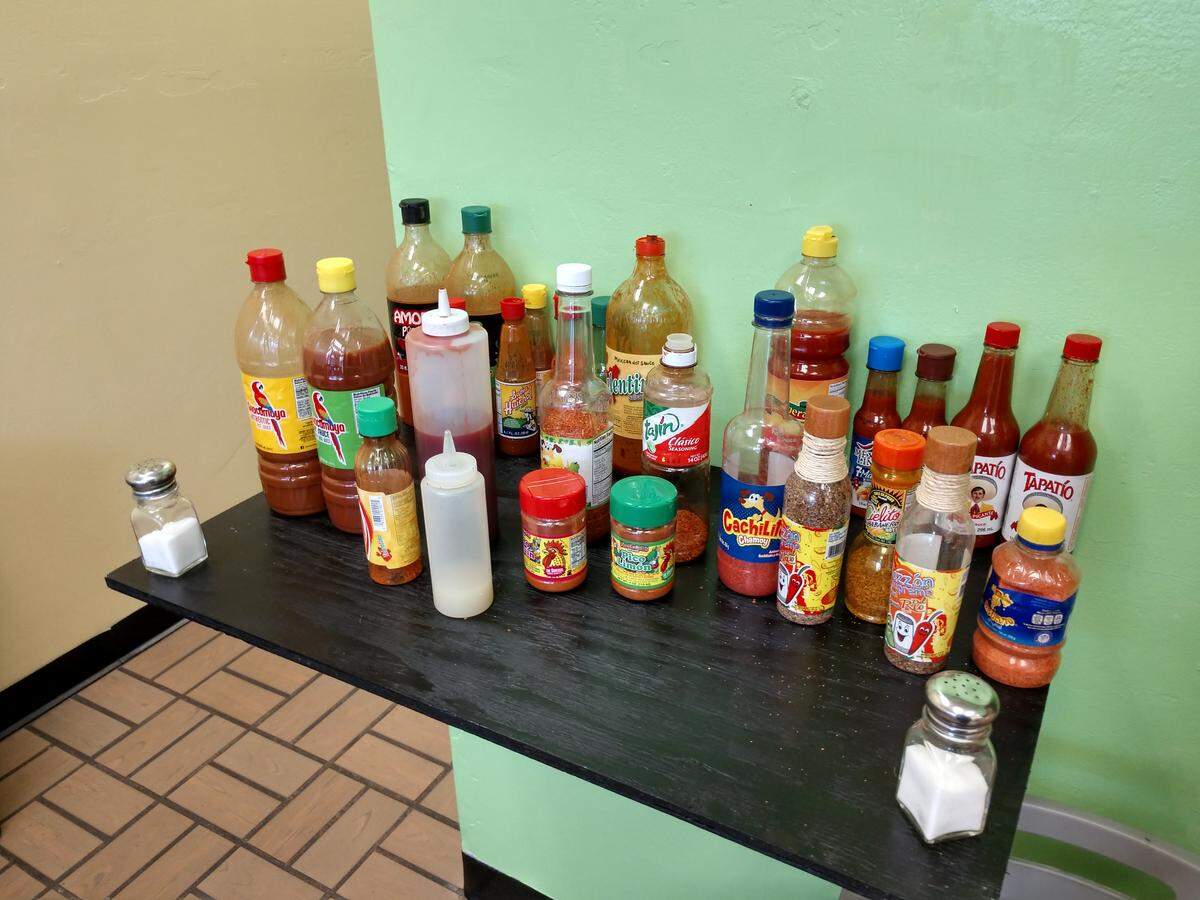 A selection of spices and hot sauces from La Casa de Sharon in Lakewood.