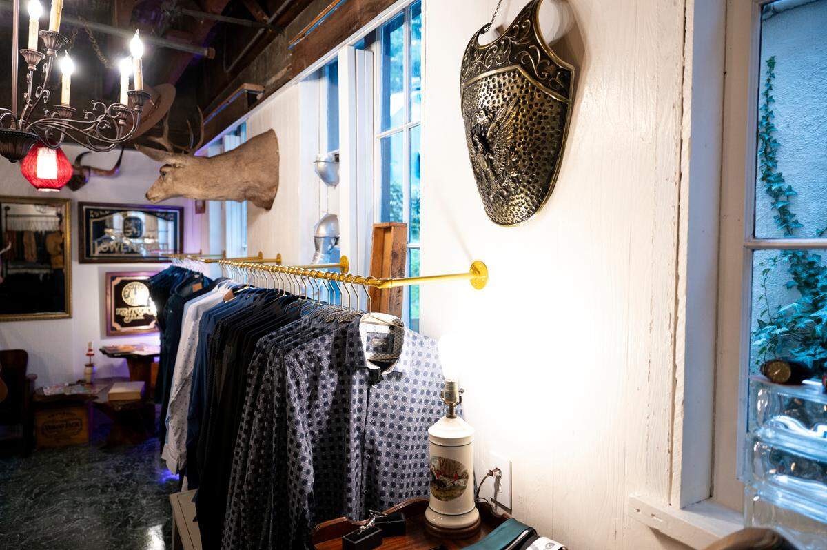 The new speakeasy barbershop in the back of One:11 has everything the modern man needs: clothes, grooming supplies and a cut and shave.