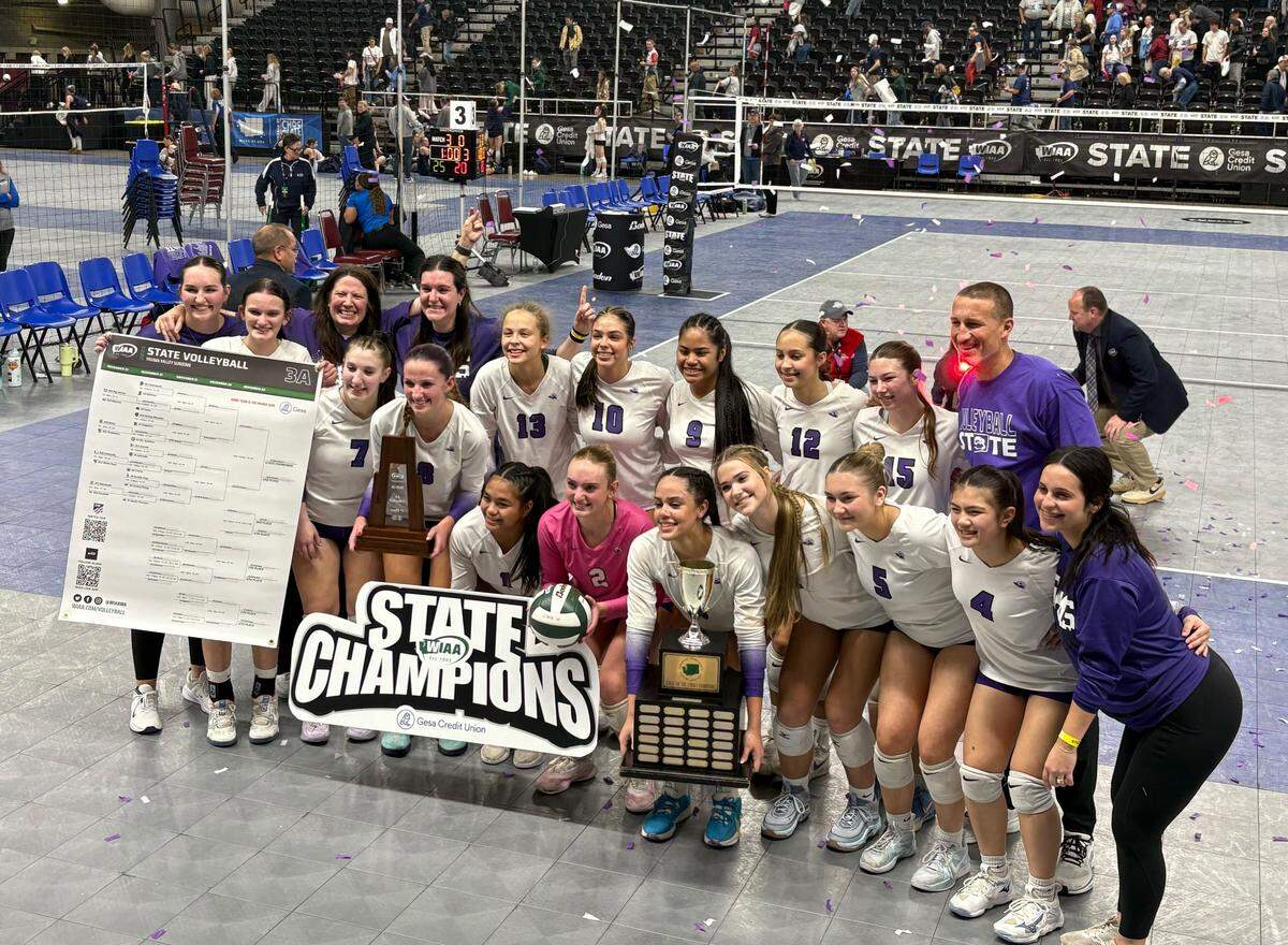 North Thurston High School’s volleyball team poses for a portrait after capturing the 3A state volleyball title at the Yakima Valley SunDome on Nov. 22, 2025, in Yakima, Wash.