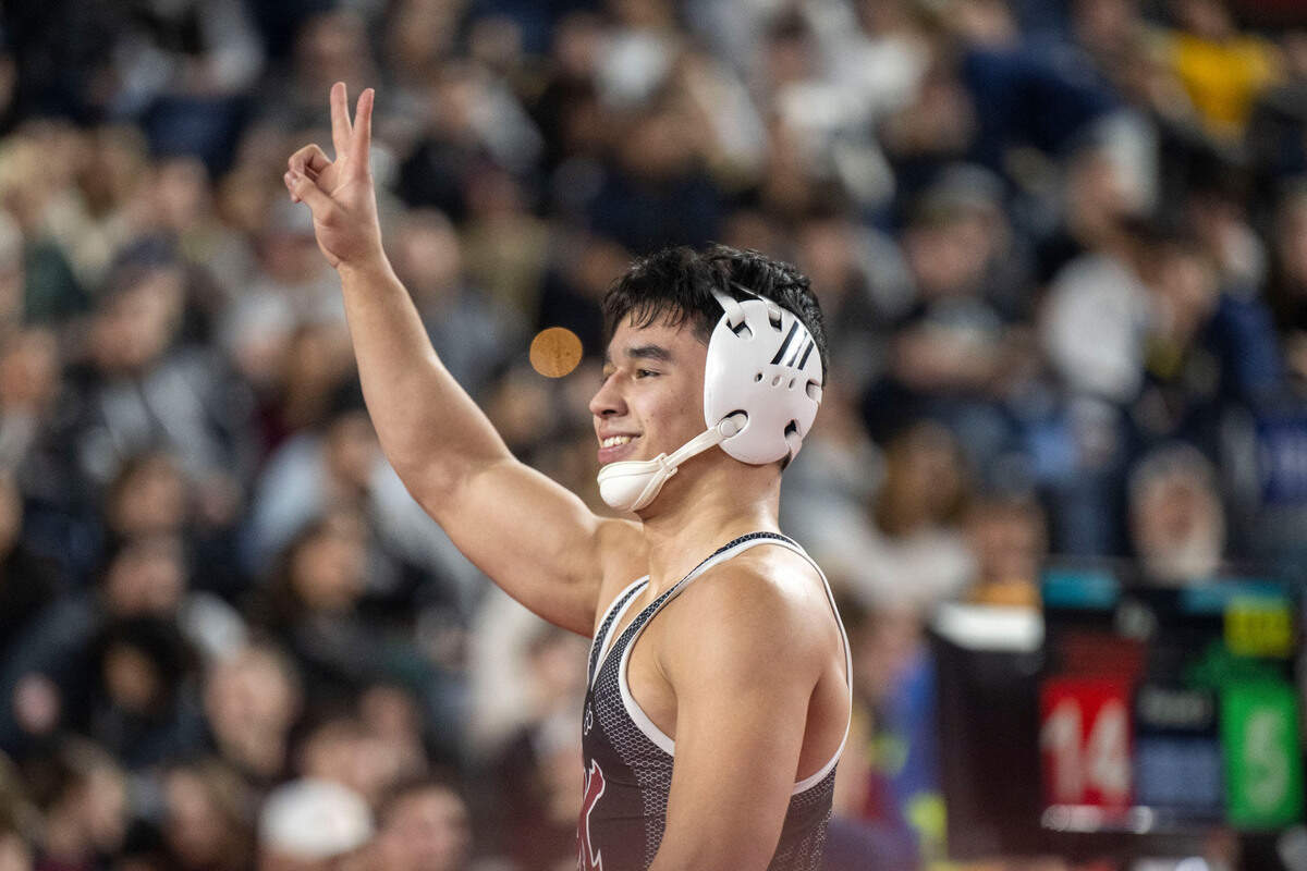 South Kitsap’s Mitchell Neiner celebrates after defeating Skyview’s Owen Pritchard by major decision, 14-5, in the 138-pound, Class 4A championship match at Mat Classic XXXIV on Saturday, Feb. 18, 2023, at the Tacoma Dome in Tacoma, Wash.
