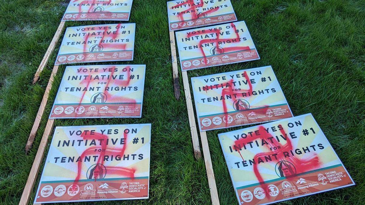 Some of Tacoma for All’s “Vote Yes on Initiative #1” yard signs were vandalized with swastikas in late October.