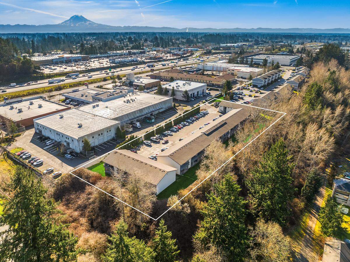 An aerial of Olympic Sunset Apartments shows the proximity of the site to Interstate 5 south of the Tacoma Mall.