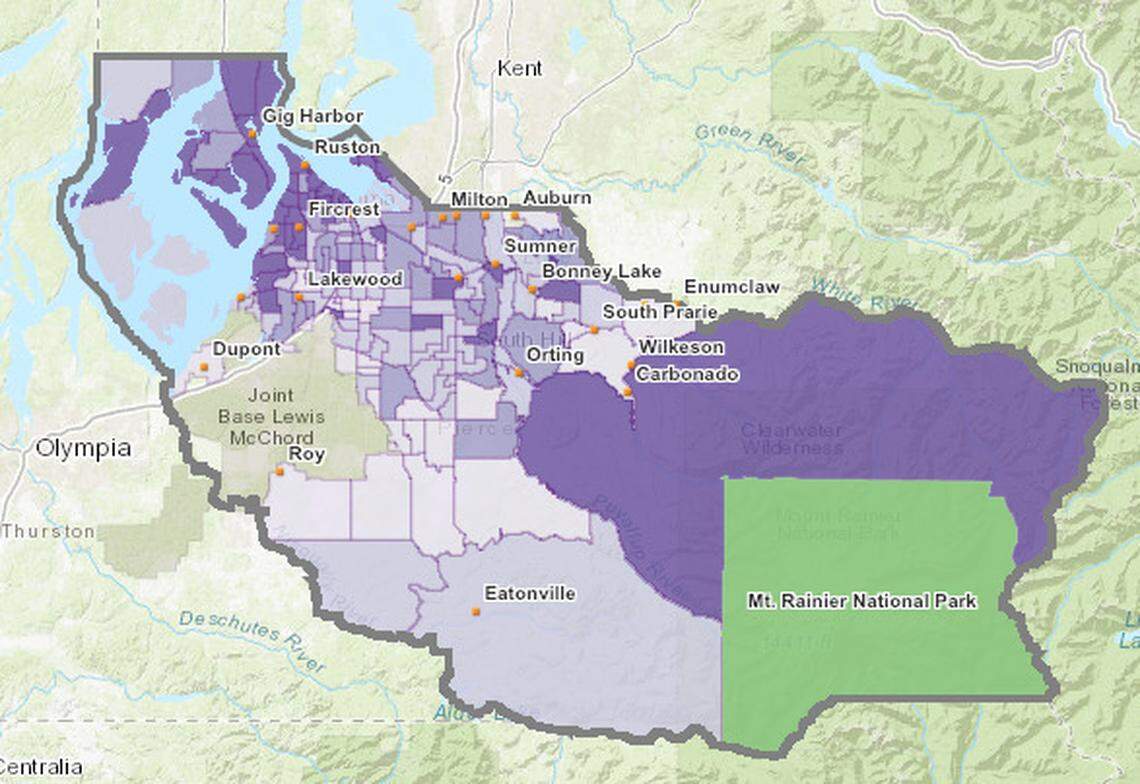 A screenshot of the Tacoma-Pierce County Health Department’s vaccine rate map on May 6 shows the census tracts in lighter colors with lower uptake. The large dark purple swath in East Pierce is a more sparsely populated area around Mount Rainier National Park.