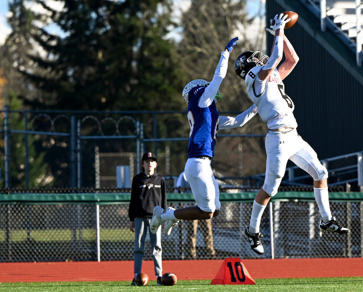 Eastlake’s Grady Woodward (8) picks off a pass intended for Graham-Kapowsin’s Jabez Woods (10) during the first half of the 4A semifinal state game at Art Crate Field, Saturday, Nov. 25, 2023, in Spanaway, Wash.