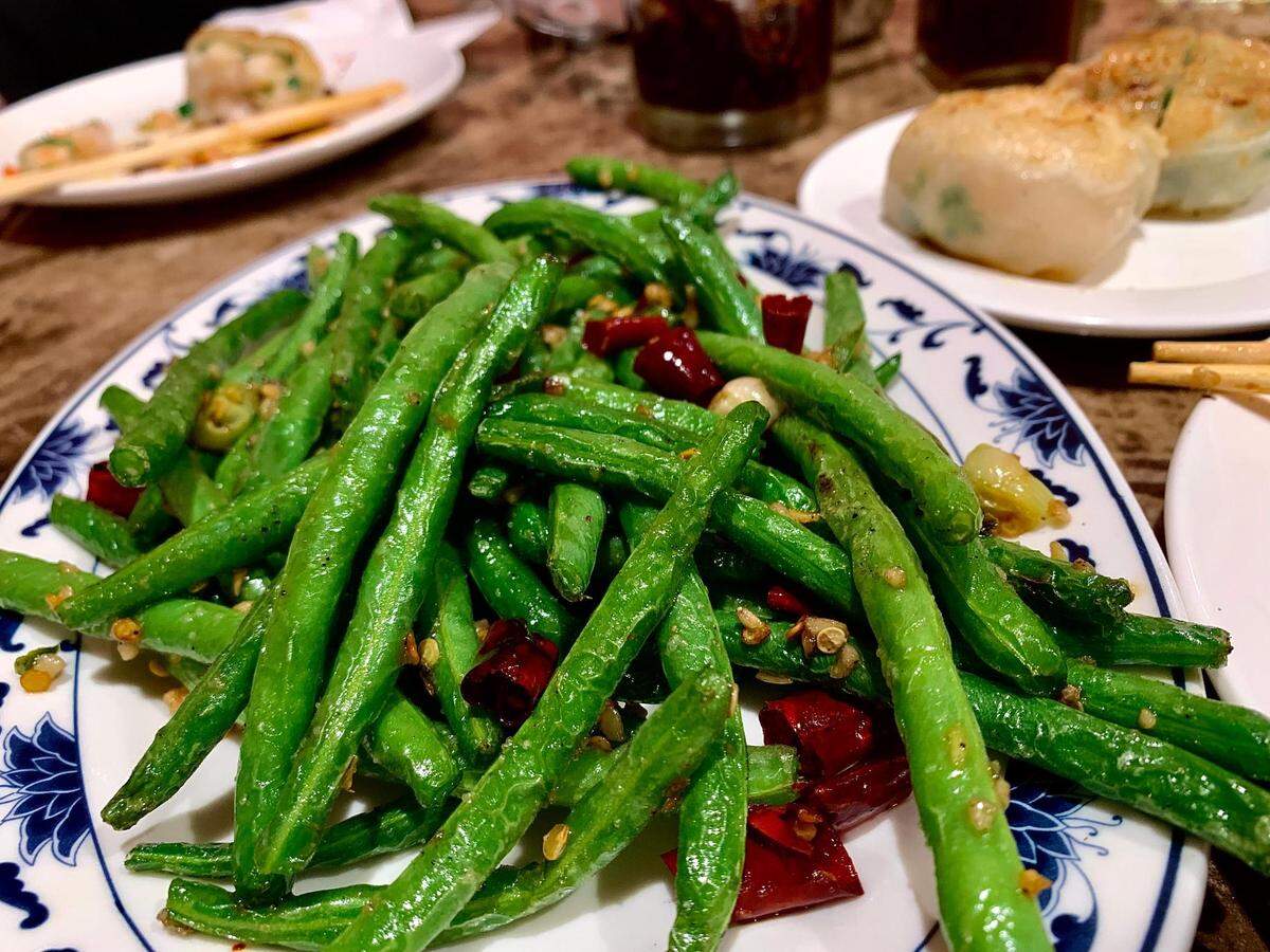 There’s just something about salt-and-pepper string beans, their wrinkly skin and garlic seasoning. At Harbor City, pair with your choice of dumplings.