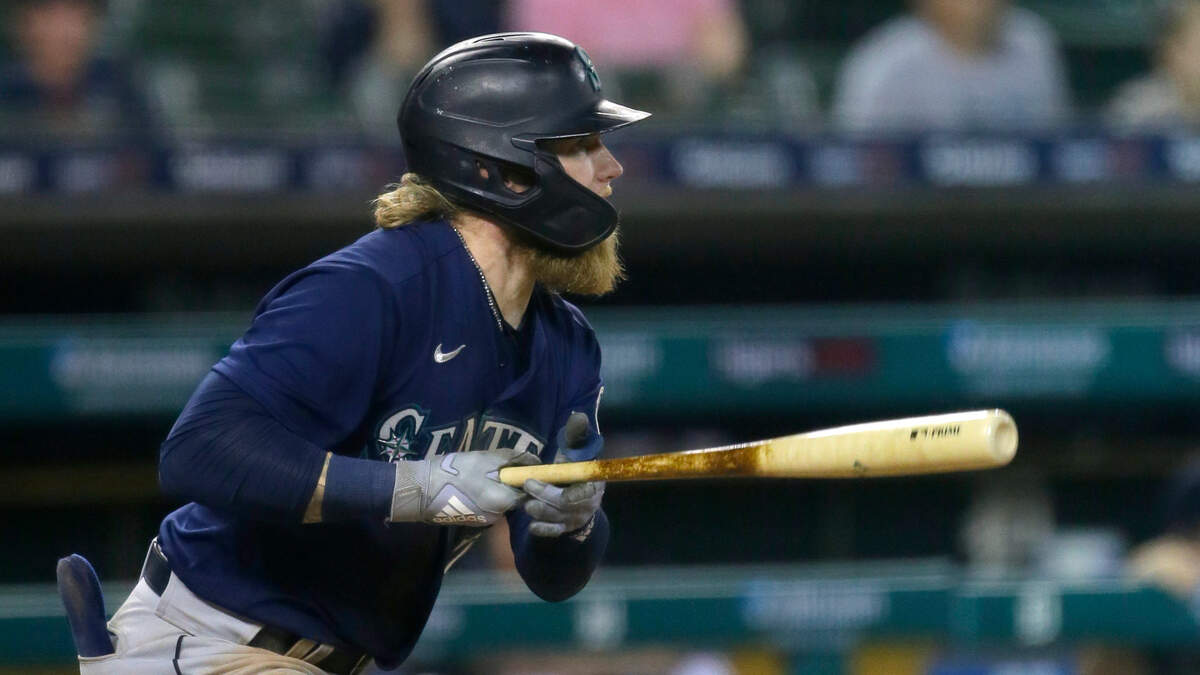 Seattle Mariners’ Jake Fraley singles to drive in a run against the Detroit Tigers during the 11th inning of a baseball game Wednesday, June 9, 2021, in Detroit. The Mariners won 9-6 in 11 innings. (AP Photo/Duane Burleson)