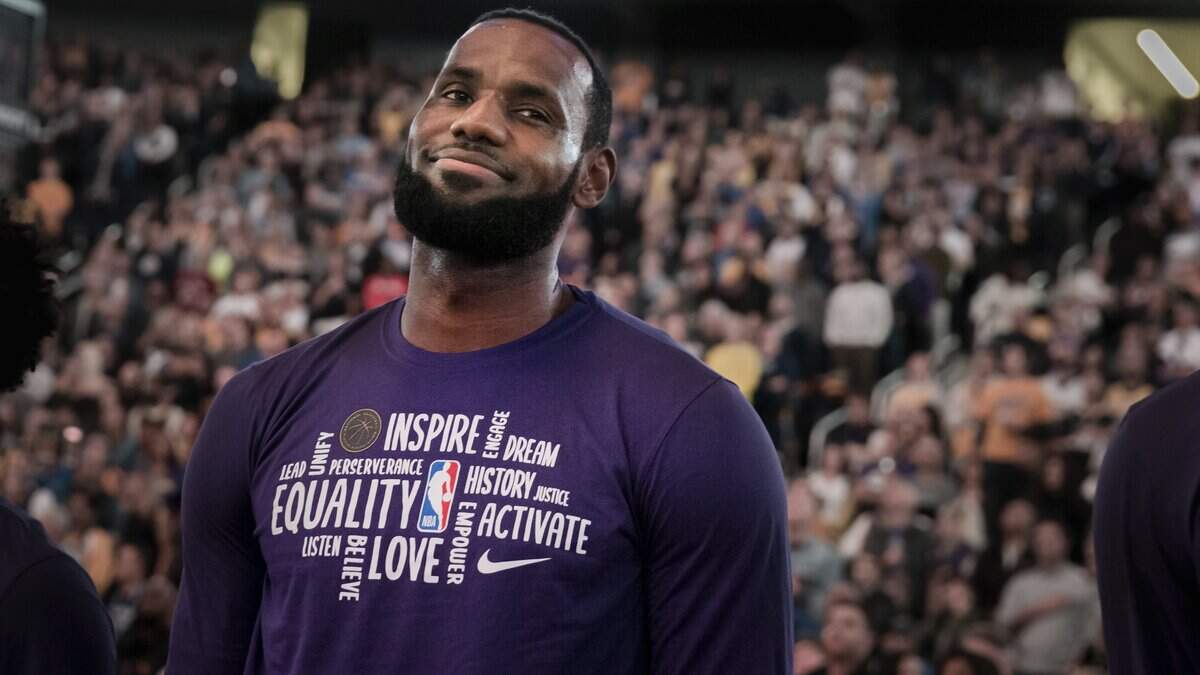 Los Angeles Lakers forward LeBron James stands for the anthem before an NBA basketball game against the Golden State Warriors in San Francisco Saturday, Feb. 8, 2020. The Lakers won 125-120. (AP Photo/John Hefti)