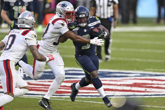 Seattle Seahawks running back Kenneth Walker III (9) is tackled during Super Bowl LX at Levi’s Stadium in Santa Clara on Sunday, Feb. 8, 2026.