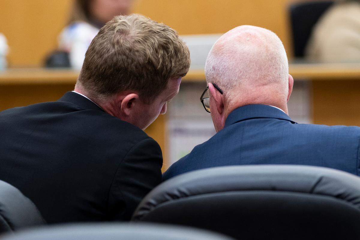 Jacob Jackson, left, speaks with his defense attorney Brett Purtzer during his trail at Pierce County Superior Court on Thursday, Dec. 12, 2024, in Tacoma, Wash. Jackson is accused for sexually abusing eight boys,