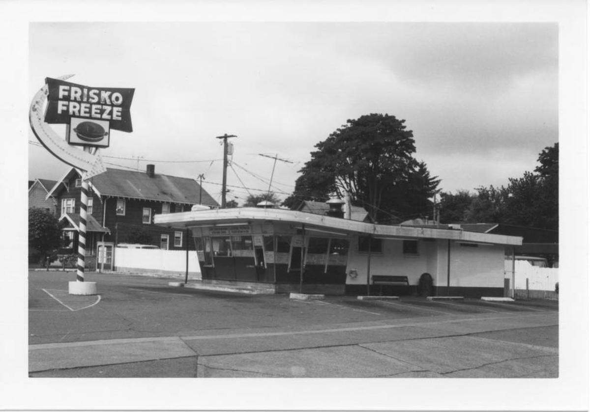 A 1977 photo of Frisko Freeze highlights its iconic 1950s Googie architecture that earned the burger stand a spot on the Tacoma Register of Historic Places in 2008. The Xitcos have restored the framework and completely renovated the interior to accommodate the pace of modern dining.