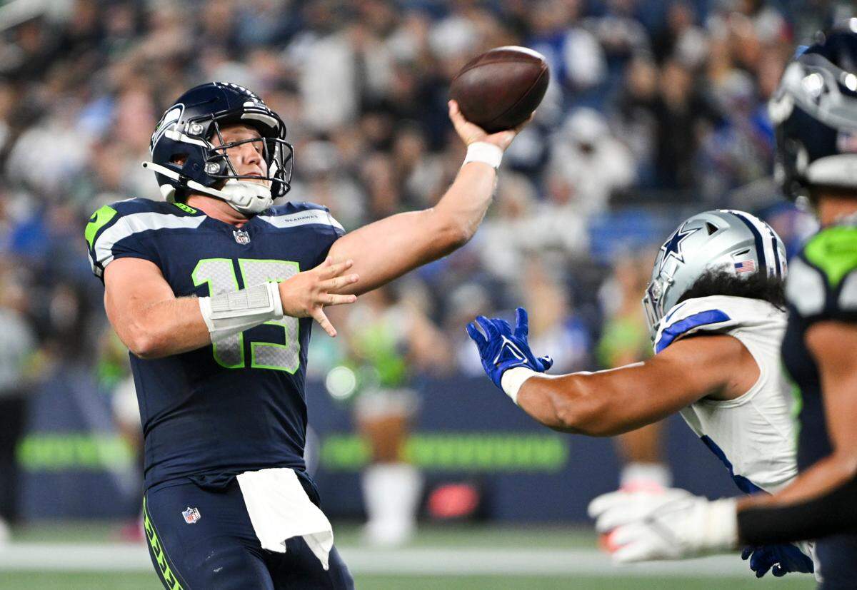 Seattle Seahawks quarterback Holton Ahlers (15) throws the ball during the fourth quarter of the preseason game against the Dallas Cowboys at Lumen Field, Saturday, Aug. 19, 2023, in Seattle, Wash.