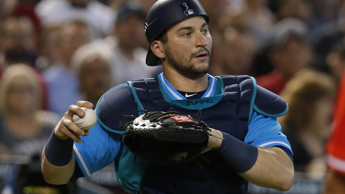 Seattle Mariners catcher Mike Zunino (3) in the first inning during a baseball game against the Arizona Diamondbacks, Saturday, Aug. 25, 2018, in Phoenix. (AP Photo/Rick Scuteri)