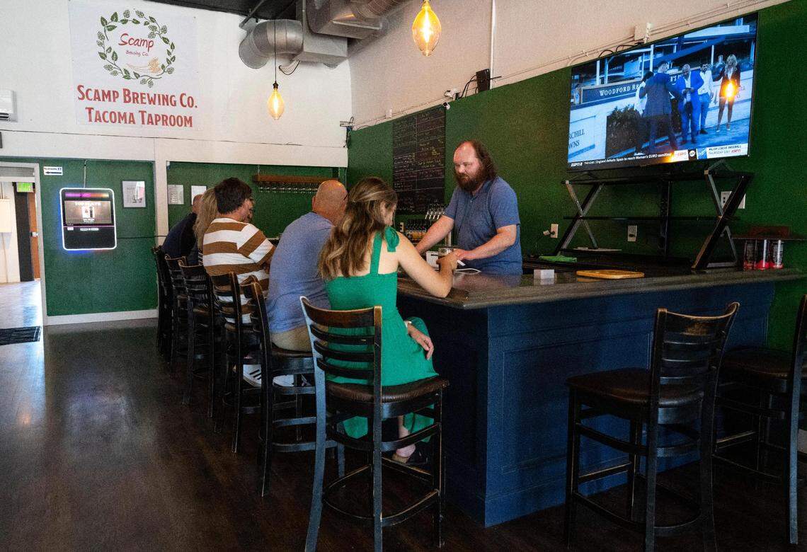 Friends and family traveled from the Auburn area to South Tacoma Way Wednesday night to celebrate the opening of Scamp Brewing’s second taproom.