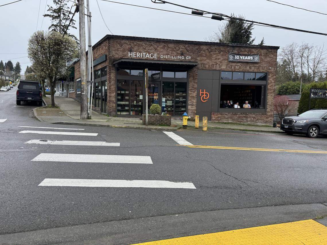 Crews will remove a crosswalk in April 2026 connecting what was formerly the Heritage Distilling Co. building to Windermere Real Estate at Pioneer Way and Harborview Drive. City staff will evaluate whether the change improves safety and efficiency at the intersection, pictured on Thursday, March 27, 2025, in Gig Harbor, Wash.