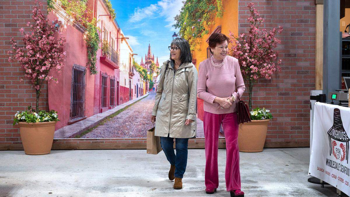 Shoppers walk through the Point Ruston Public Market in Tacoma, Washington, on Tuesday, Oct. 10, 2023.