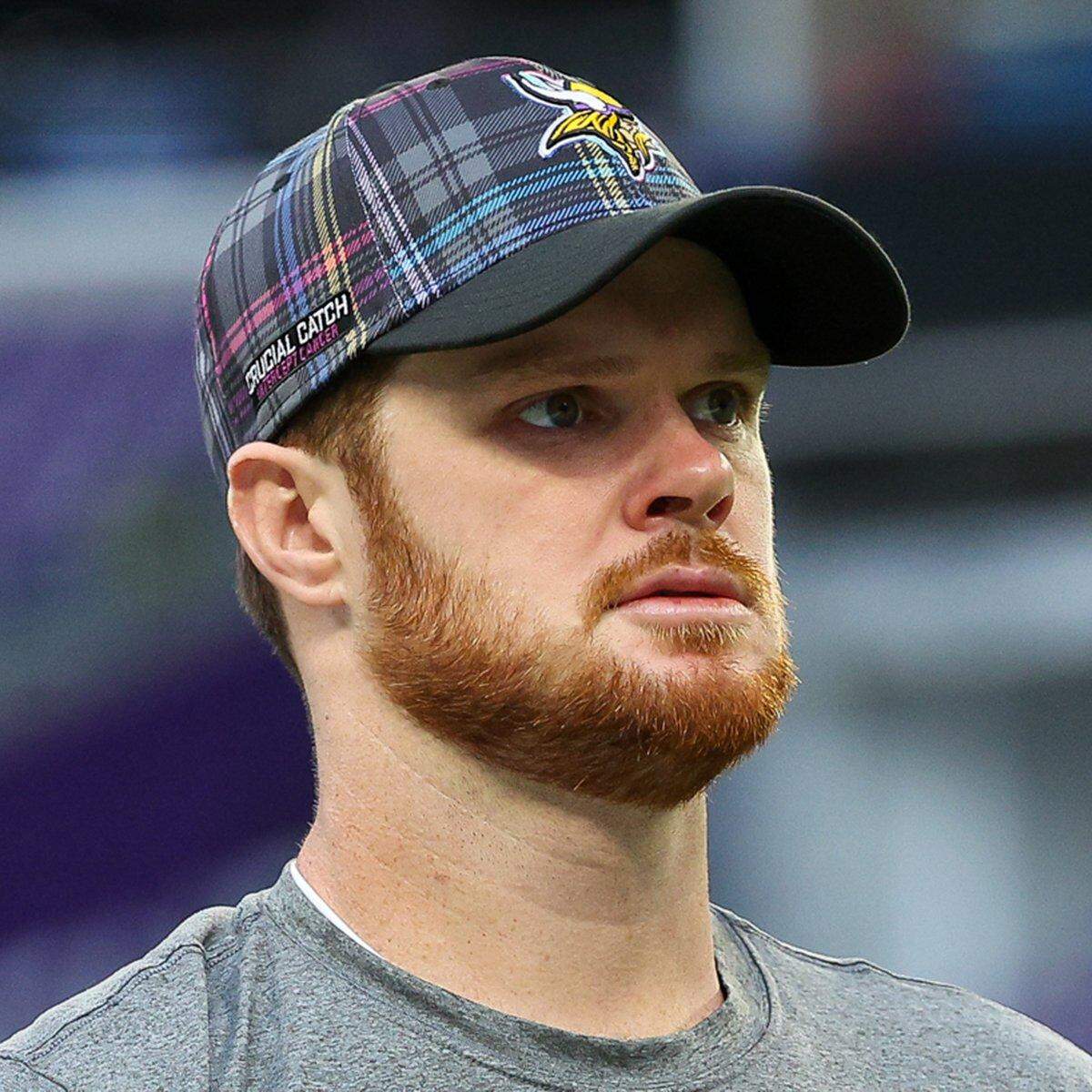 Oct 20, 2024; Minneapolis, Minnesota, USA; Minnesota Vikings quarterback Sam Darnold (14) warms up before the game against the Detroit Lions at U.S. Bank Stadium. Mandatory Credit: Matt Krohn-Imagn Images