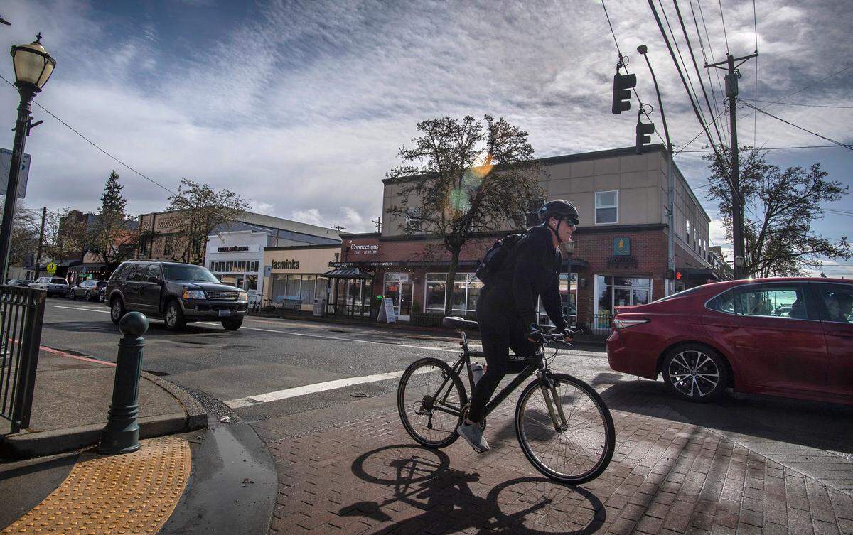 A five-story aparment building is planned for the space of the former Jasminka women’s clothing boutique (left center) in the Proctor District of Tacoma, Washington, on Tuesday, March 15, 2022.