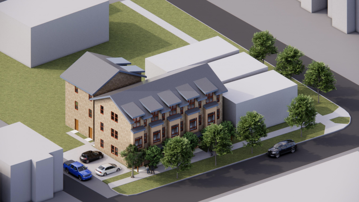 One rendering submitted to the City of Tacoma for redevelopment of 1701 S. L St. shows the three current structures on site remaining along L Street and the addition of three-level housing units.
