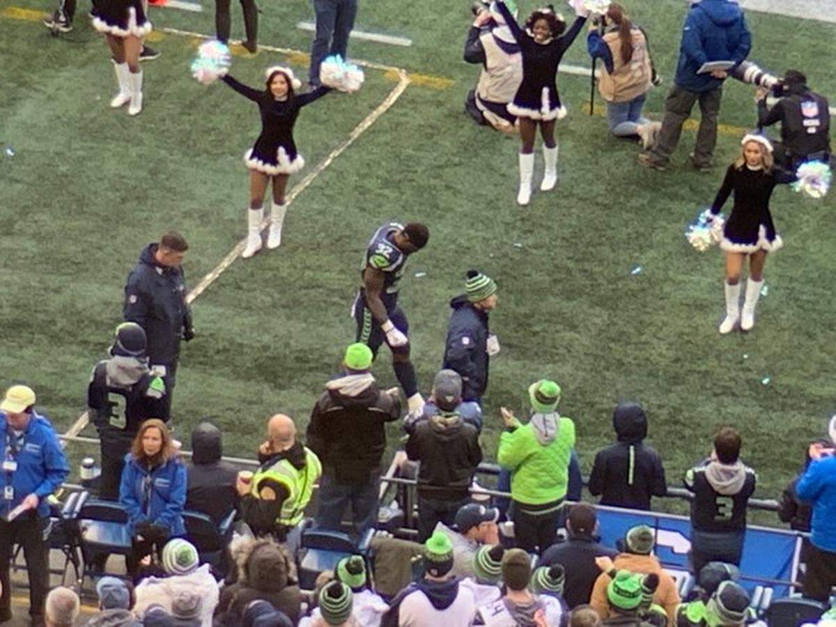 Seahawks 1,200-yard rusher Chris Carson leaves the field with an assistant and goes to the locker room after injuring his hip during the first half of Sunday’s game against Arizona.