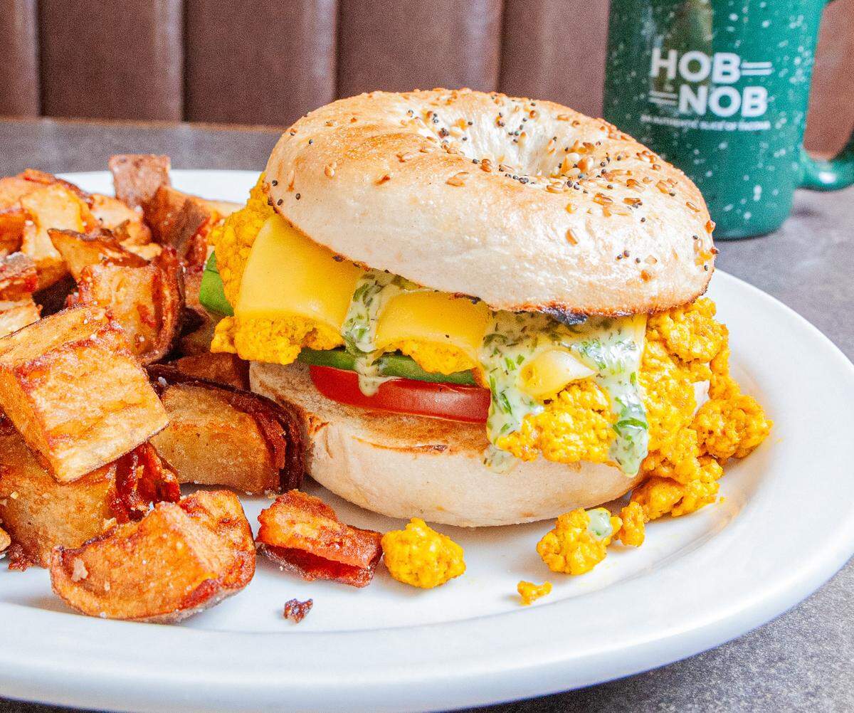 The vegan bagel at the Hob Nob, which comes with vegan cheese, tomato, avocado, tofu egg-stitute and green goddess dressing.