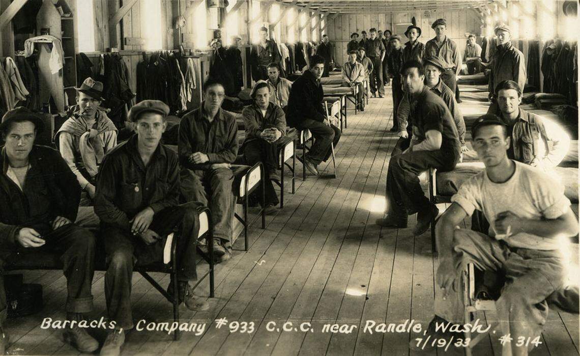 Men pose for a photo in barracks at a Civilian Conservation Corps camp near Randle, Wash. on July 19, 1933.