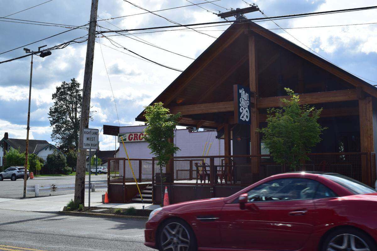 The 1910 Craftsman was most recently a teriyaki restaurant. The Joneses salvaged much of the materials and doubled the seating capacity with a year-round deck overlooking Wood Avenue and Main Street.