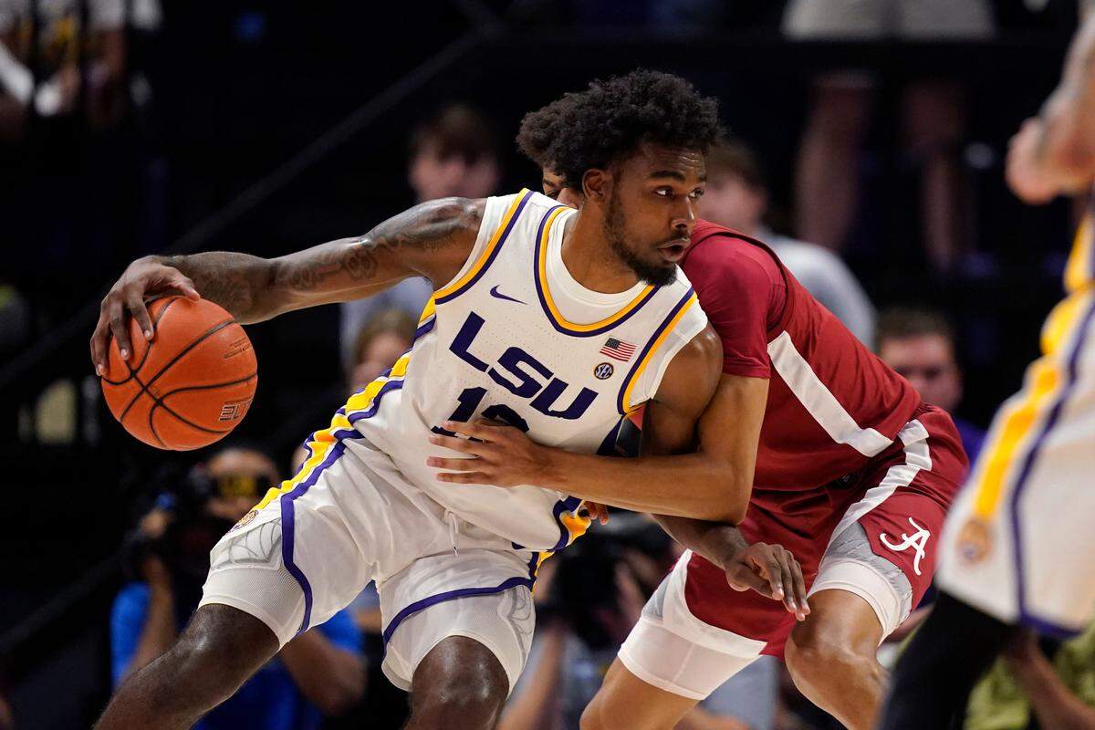 LSU forward Tari Eason (13) drives to the basket in the first half an NCAA college basketball game against Alabama in Baton Rouge, La., Saturday, March 5, 2022. (AP Photo/Gerald Herbert)