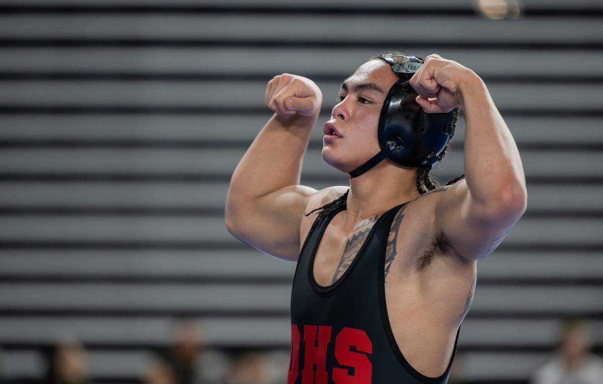 Orting’s Apollo Cruz reacts to his victory over Tumwater’s Mekhi Richardson in the 150-pound 2A semifinal match during day two of the Mat Classic XXXV at the Tacoma Dome on Saturday, Feb. 17, 2024, in Tacoma, Washington.
