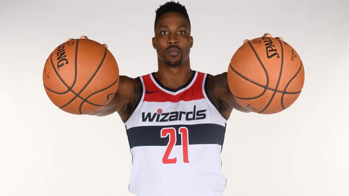 Washington Wizards center Dwight Howard poses for a photograph during an NBA basketball media day, Monday, Sept. 24, 2018, in Washington. (AP Photo/Nick Wass)