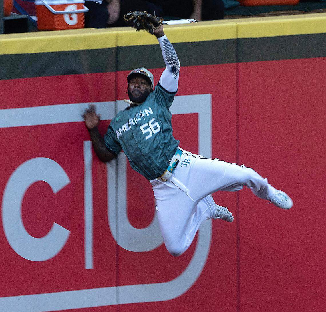 American League left fielder Randy Arozarena makes a leaping catch at the wall during the Major League Baseball All-Star Game at T-Mobile Park in Seattle, Washington, on Tuesday, July 11, 2023.