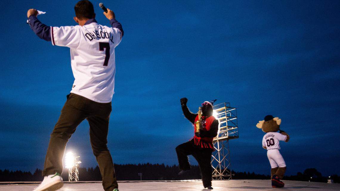 TNT columnist Matt Driscoll dances along with Epic Sax Gorilla and Rhubarb on the roof of Cheney Stadium during the Tacoma Rainiers’ game against the Las Vegas 51s at Cheney Stadium on June 28, 2018. The performance later led to fines against the Rainiers and a much smaller one against the newspaper.
