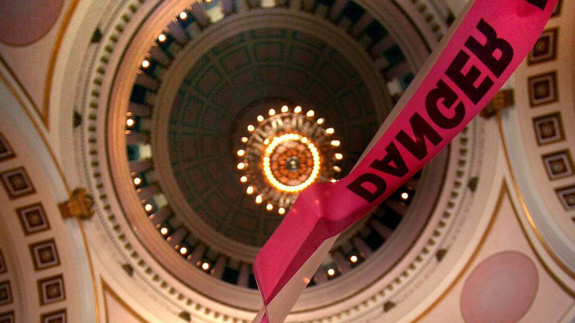 Warning tape is been placed inside the Capitol Rotunda where workers will soon begin a huge renovation project.photo by Mike Salsbury