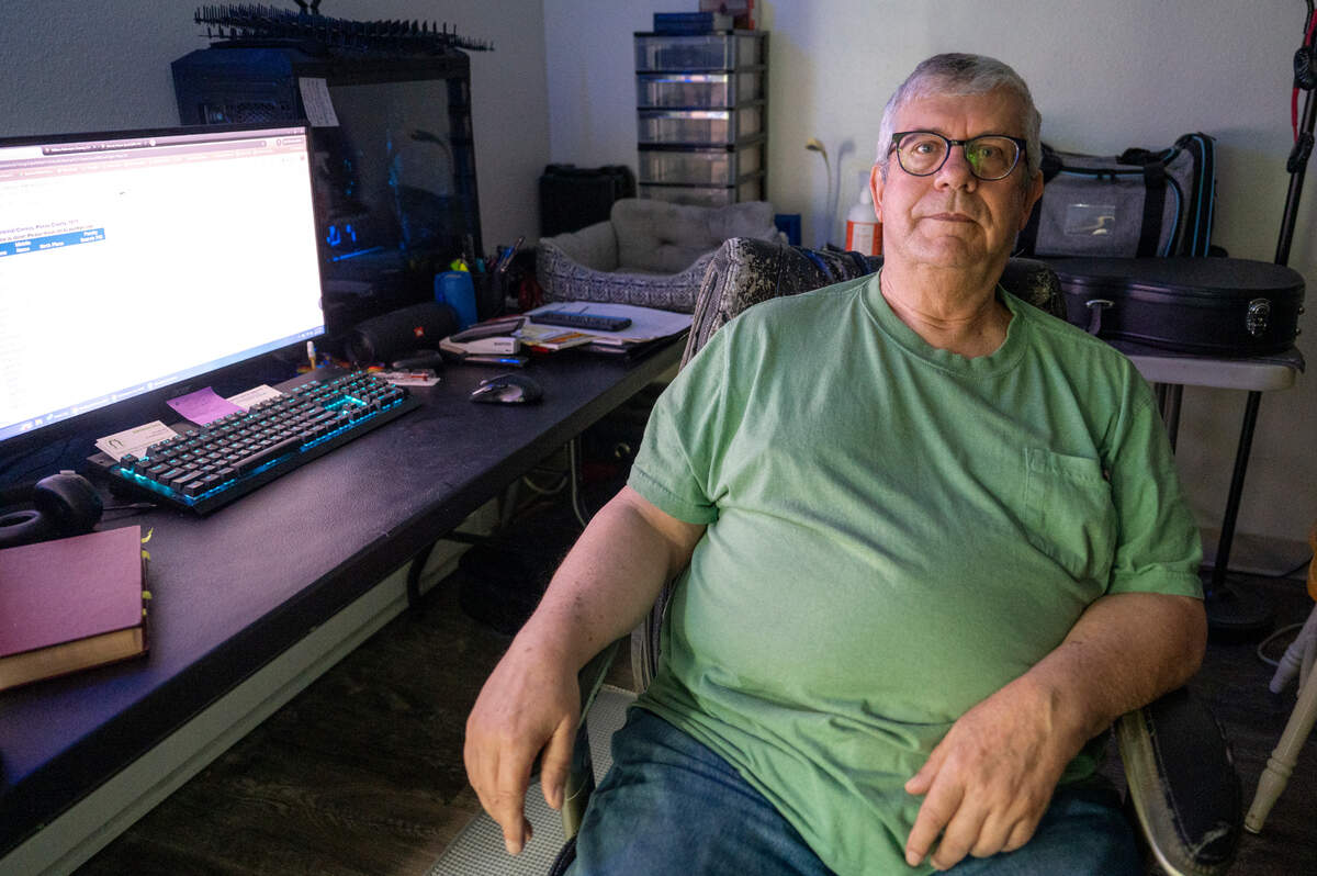 Michael Allen, vice president of the Tenant Association at Wright Park House, sits for a photo in his apartment at the complex on Tuesday, May 13, 2025, in Tacoma, Wash. Allen himself has dealt with knee pain and a need to have