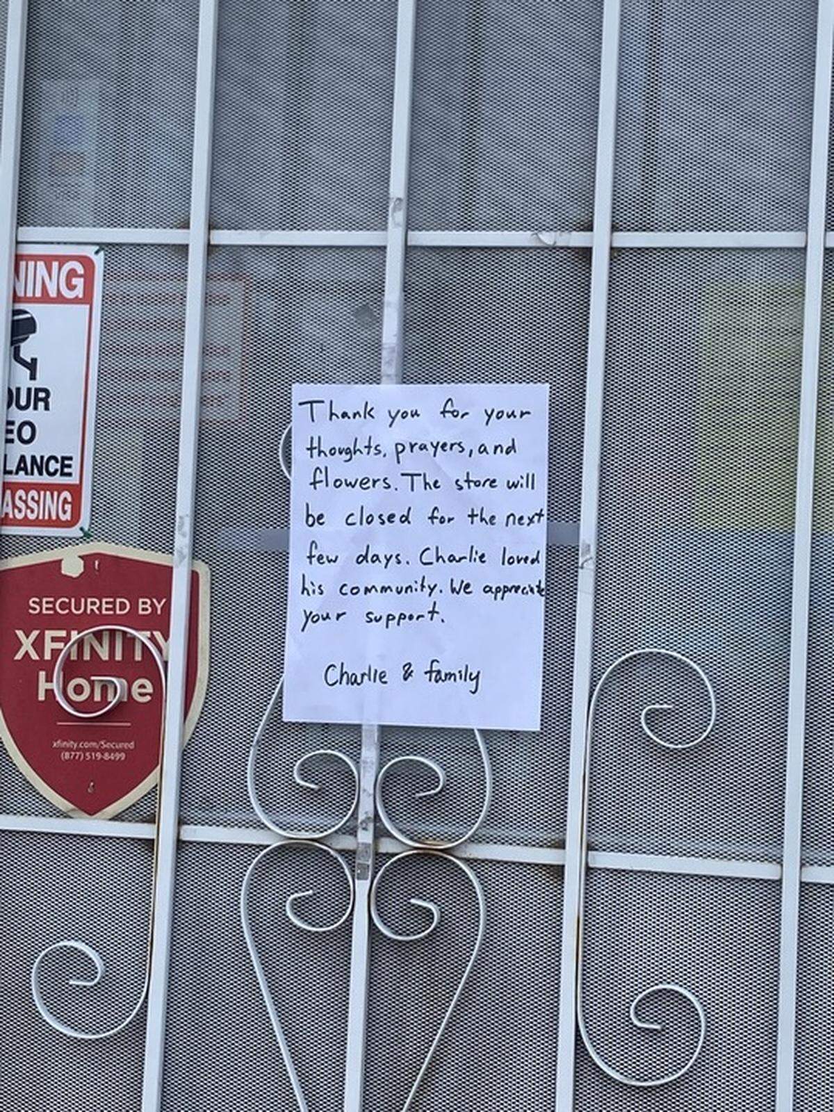 A sign on the front door of The Little Store on Ainsworth Avenue and 35th Street in Tacoma, Washington.