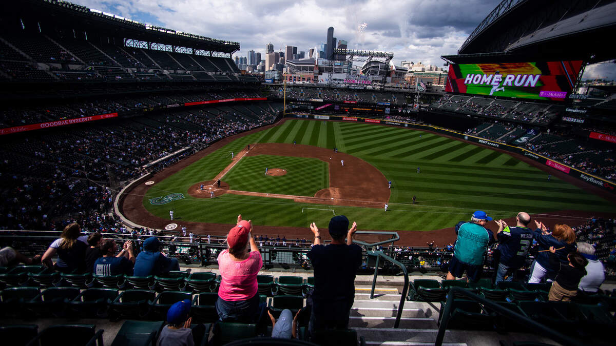 Fans cheer as Daniel Vogelbach hits a home run in the first inning. The Seattle Mariners played the Kansas City Royals in a Major League Baseball game at T-Mobile Park in Seattle, Wash., on Wednesday, June 19, 2019.