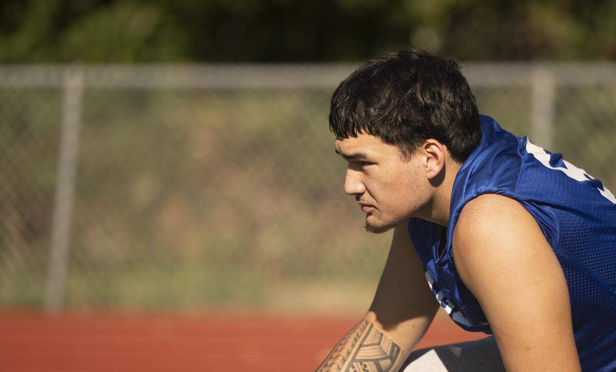 Graham-Kapowsin offensive lineman Ayden Bullinger looks on during a football practice at Graham-Kapowsin High School on Friday, Aug. 22, 2025, in Graham, Wash.