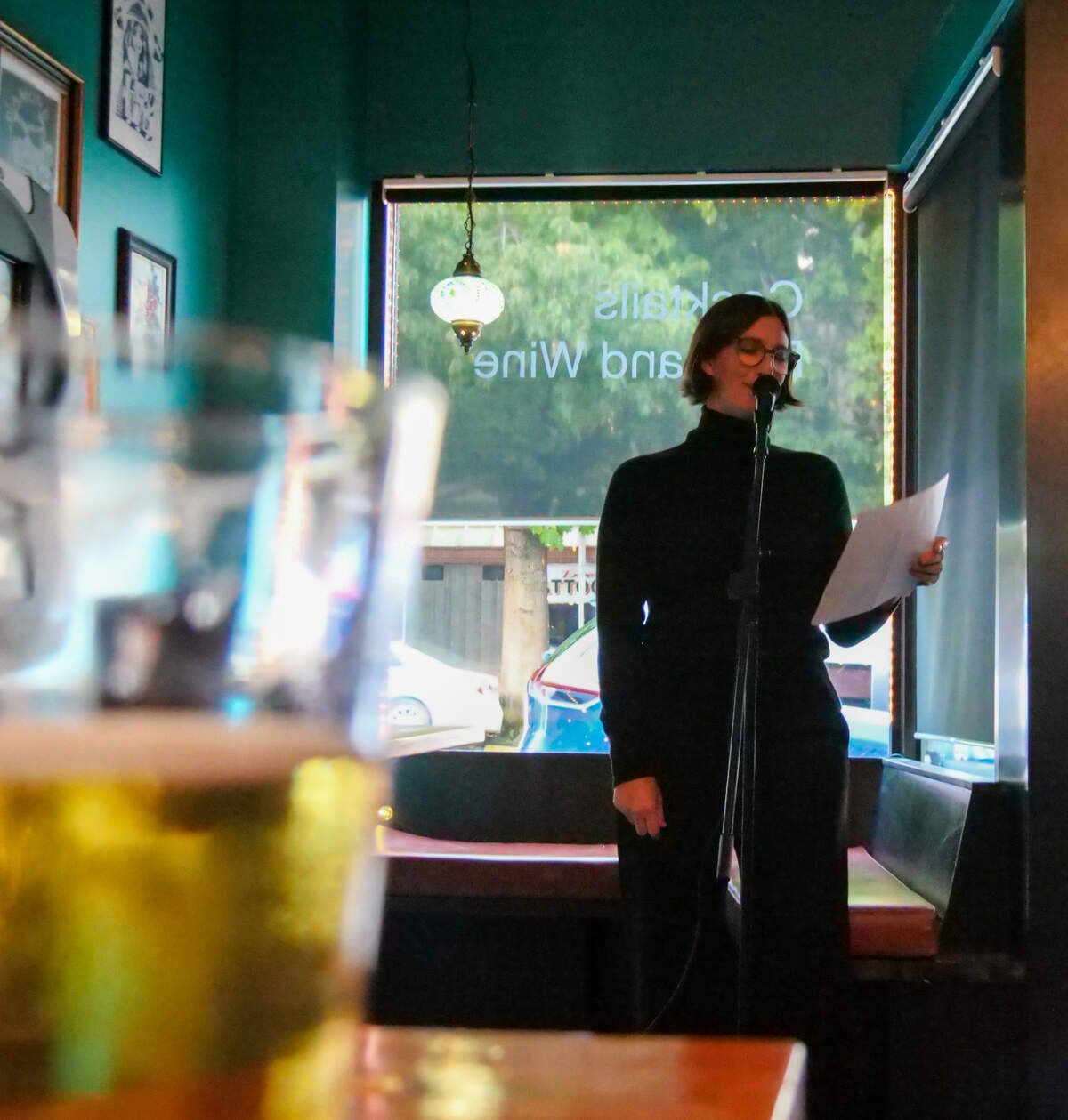 Tacoma’s Jenny Bartoy presents during Creative Colloquy’s “lit crawl” on Tuesday, Oct. 3 at a reading event held at Blue Rose Bar.