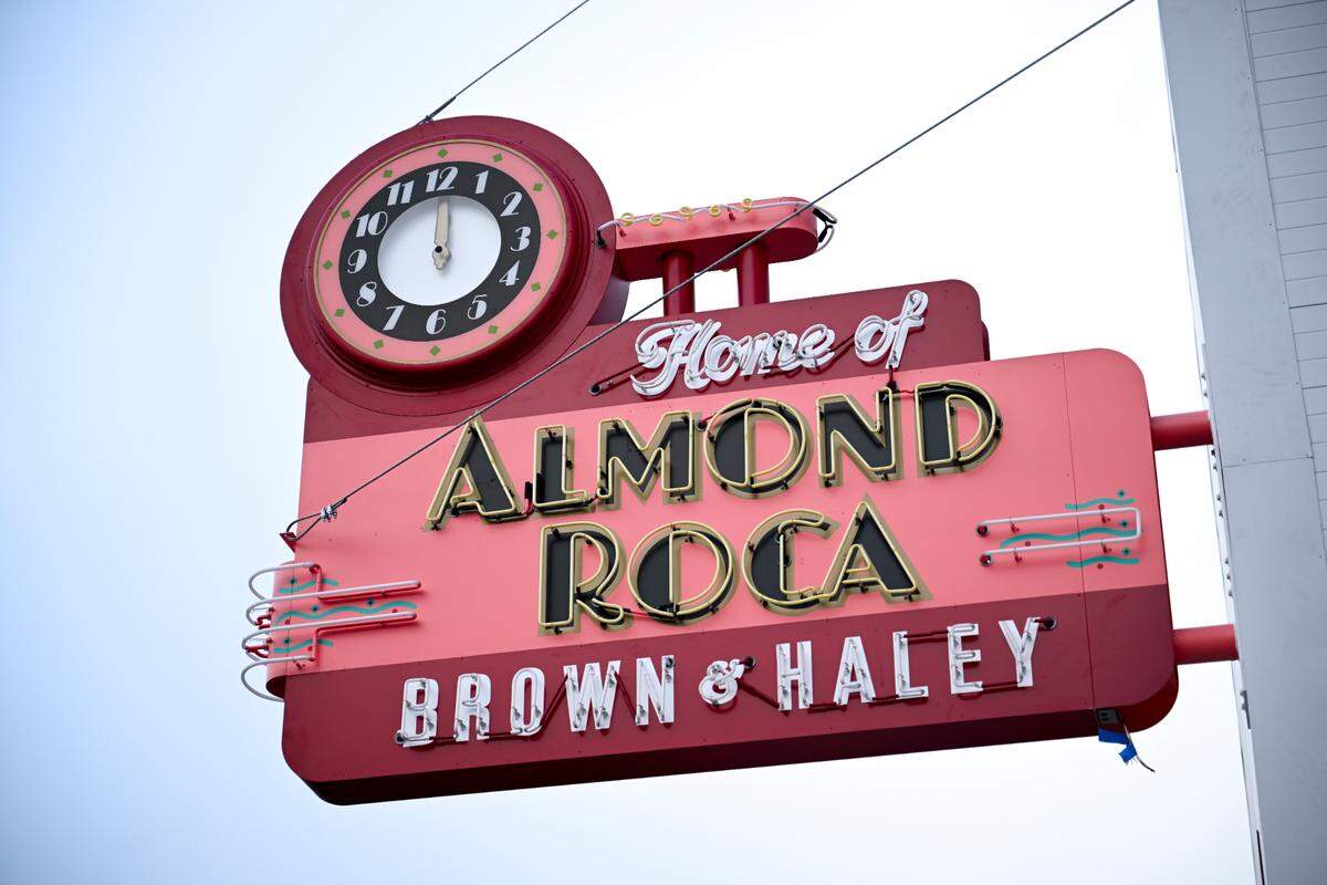 The brand new Almond Roca sign hangs on Brown & Haley factory, Thursday, Oct. 5, 2023, Tacoma, Wash.