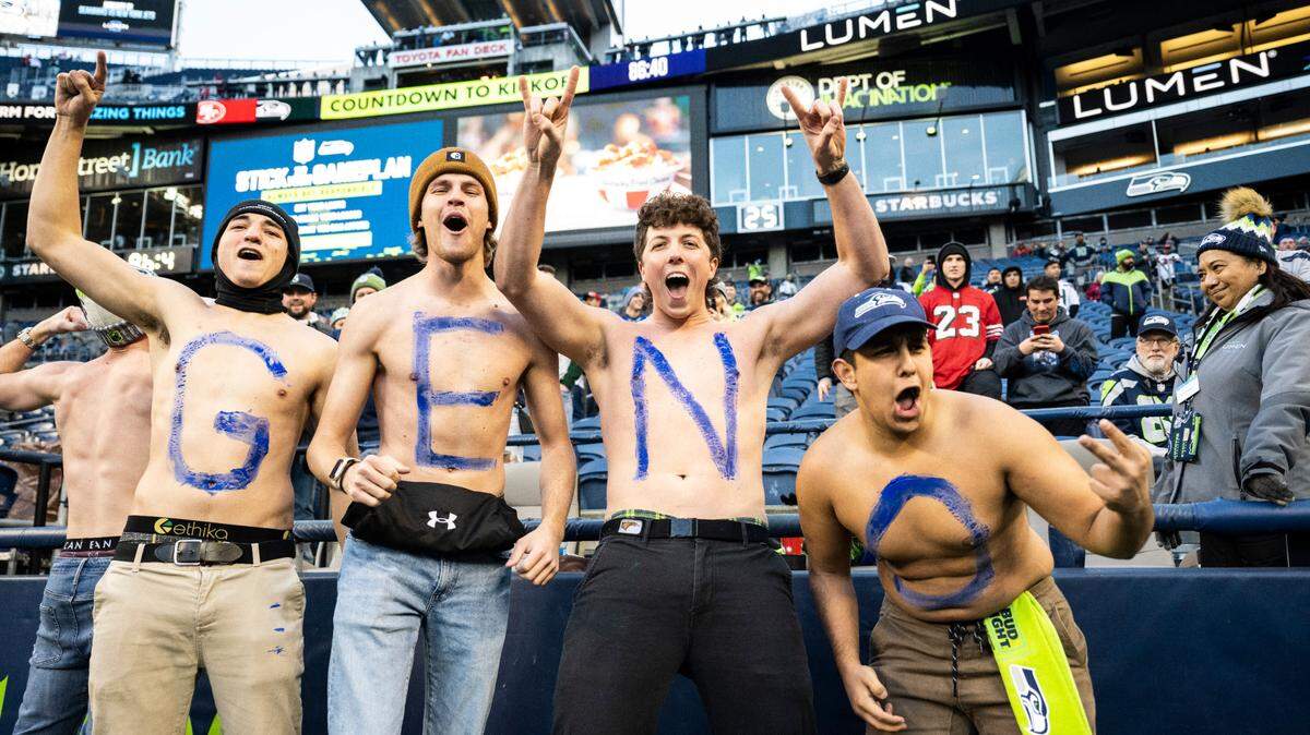 Seattle Seahawks fans cheer for Seattle Seahawks quarterback Geno Smith (7) during warm ups before the start of an NFL game against the San Francisco 49ers at Lumen Field in Seattle Wash., on Dec. 15, 2022.