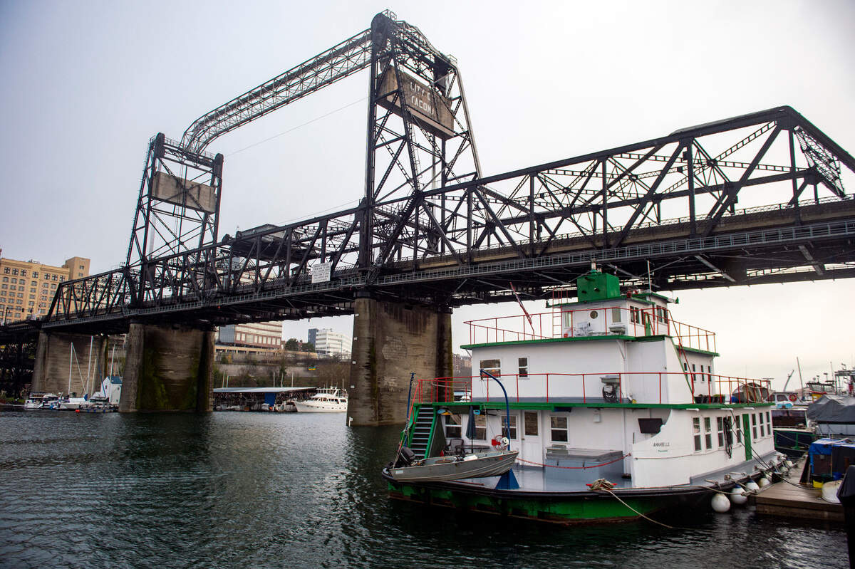 Docked below the Murray Morgan Bridge on the city’s Foss Waterway sits the Annabelle, a 12-car ferry turned into a home to Dennis and Katherine Redmon.