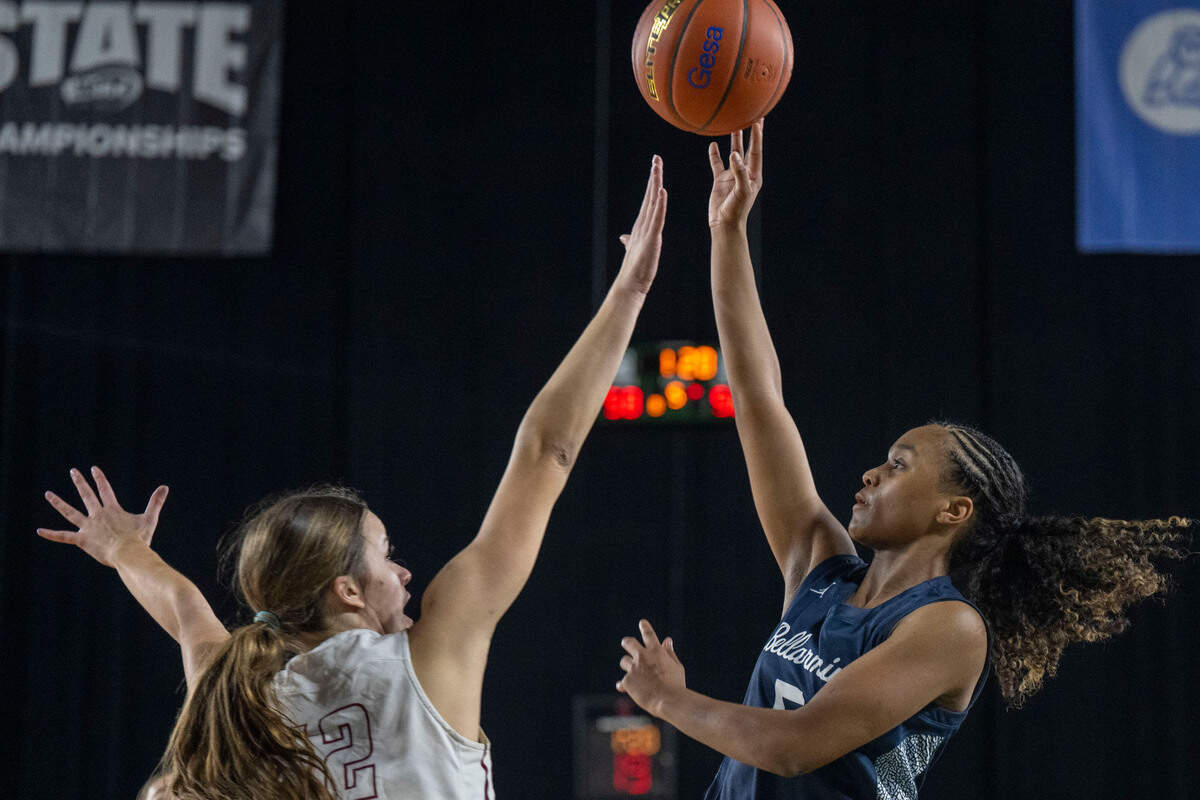 Bellarmine Prep guard Kiara Stone (5) attempts a shot as Eastlake forward Krista Kostoff (12) defends during the fourth quarter of a Class 4A quarterfinal game on Thursday, March 2, 2023, in Tacoma, Wash.