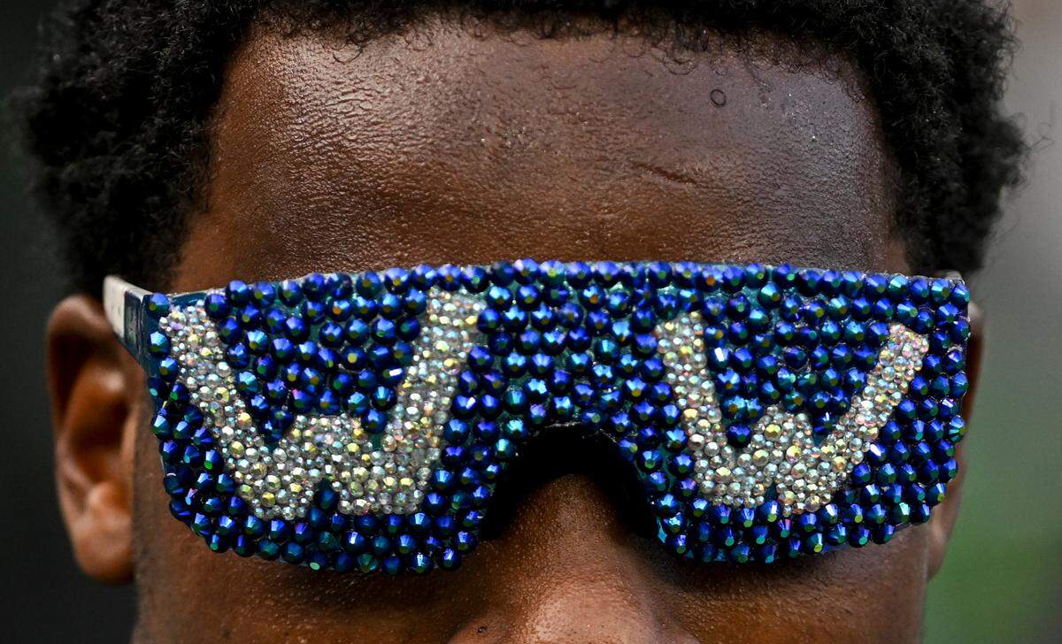 Seattle Seahawks cornerback Devon Witherspoon (21) wears “W” glasses after the Seahawks’ 20-10 victory against the Arizona Cardinals at Lumen Field, Sunday, Oct. 22, 2023, in Seattle, Wash.