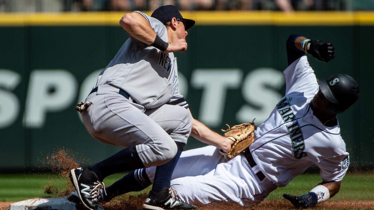 Seattle Mariners center fielder Keon Broxton (4) is tagged out while trying to steal second. The Seattle Mariners played the New York Yankees in a Major League Baseball game at T-Mobile Park in Seattle, Wash., on Wednesday, Aug. 28, 2019.