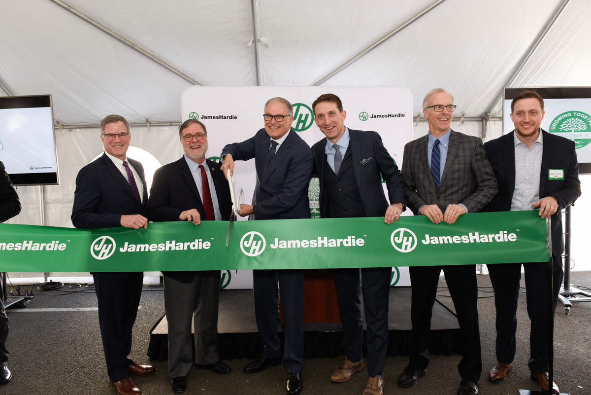 EDB President and CEO Bruce Kendall (second from right) was among local and state officials who turned out in 2020 to celebrate the expansion of James Hardie Industries in Frederickson.