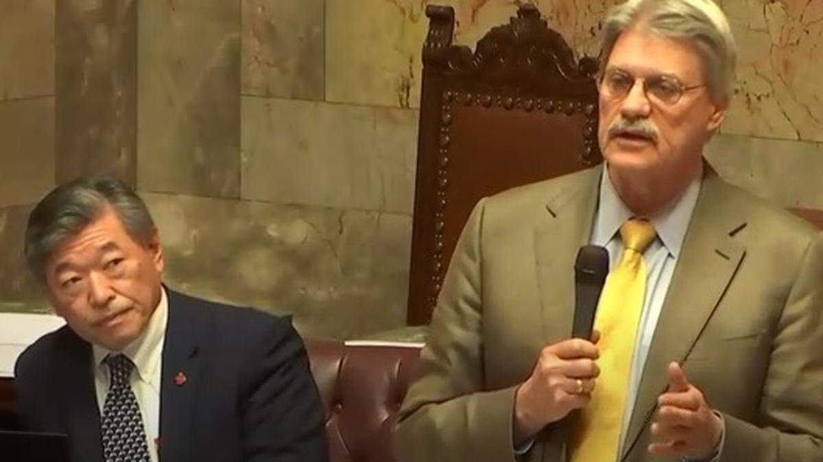 Washington state Democratic Sen. Tim Sheldon (right) gives an April 15 floor speech warning that disclosing public officials’ personal information is potentially dangerous. He told the story of the wife of an elected official being abducted in Mexico, which turned out to be false.