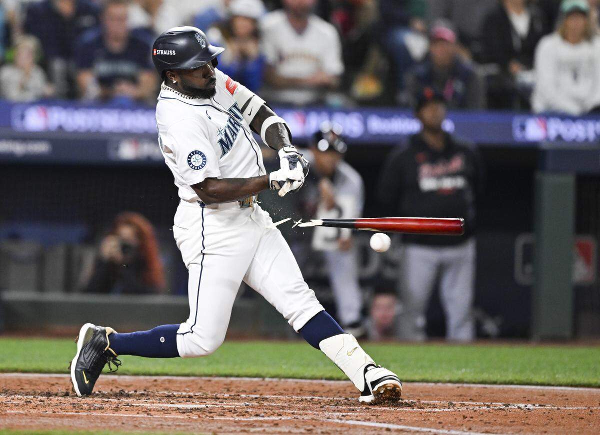 Seattle Mariners left fielder Randy Arozarena (56) breaks a bat during the third inning of Game 5 of the AL Division Series at T-Mobile Park, on Friday, Oct. 10, 2025, in Seattle.