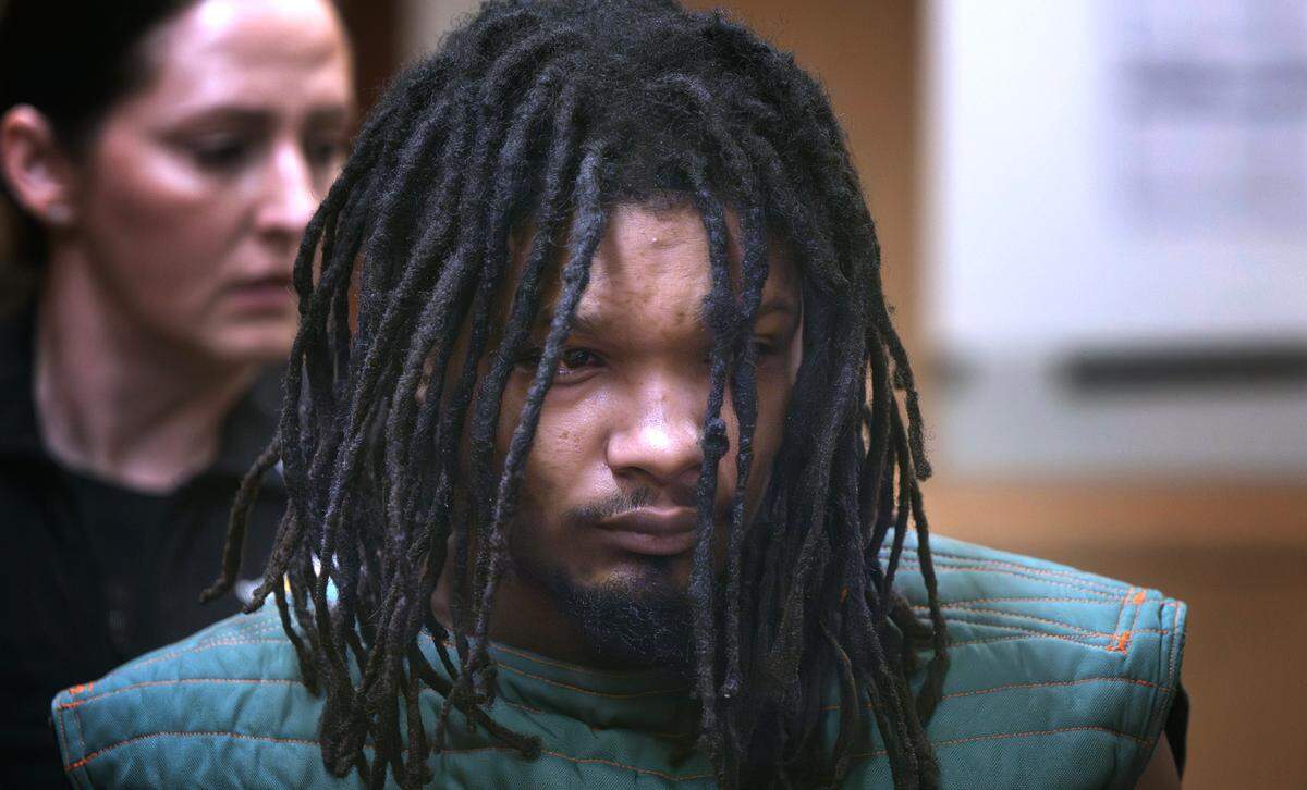 Vendell Edward Henderson, 22, appears in Pierce County Superior Court in Tacoma, Washington, on Dec. 31, 2024, to be arraigned on charges of second-degree murder in the shooting death of his father following an argument in their Spanaway-area home on Dec. 30.